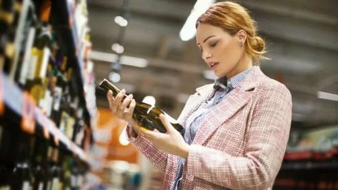 Shoppers swap clothes for alcohol amid a record sales drop